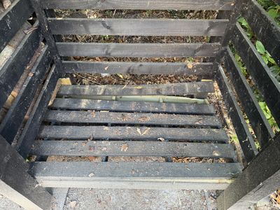 Right hand bay of the log store showing how the flooring has collapsed.