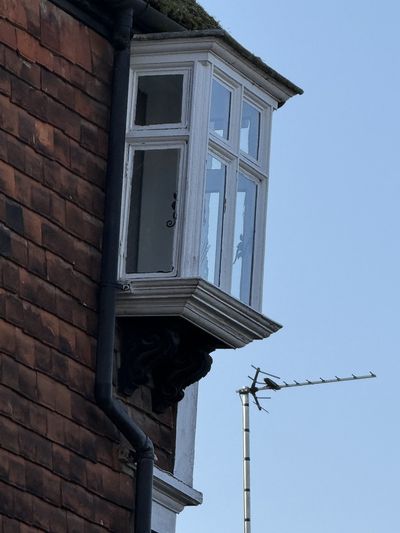 A small bay window high on the corner of a house in Rye giving great views from a bedroom across the Romney Marsh to the north.