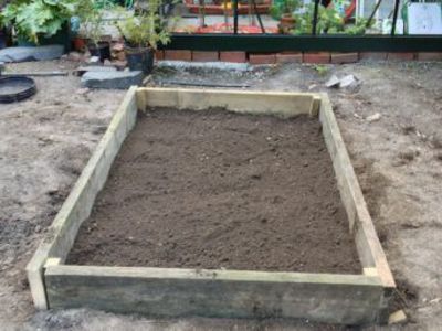 Area cleared, raised bed built.