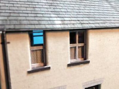 Whitesands Quay cottages close up of upstairs windows.