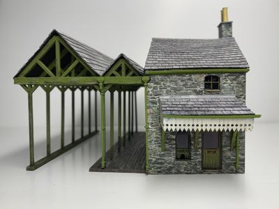 Completed model front view with canopy attached, rain gutters and downpipes